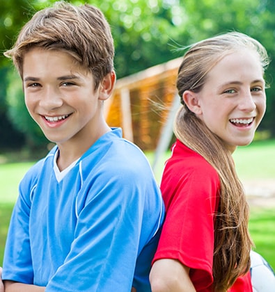 Teens Holding Folders